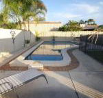 62 Tingira Close Modern lowset home with swimming pool outdoor area ample parking. Pet friendly