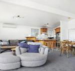 Penguin Cove relax on the beach - Accommodation Guide