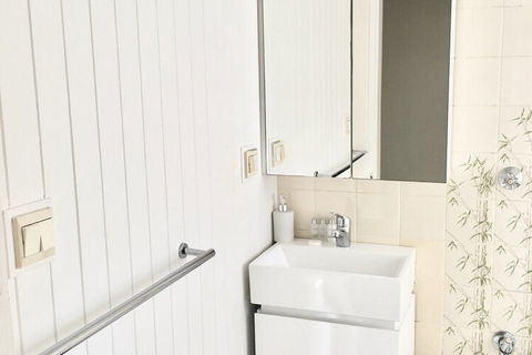 Minimalist Beachfront Apartment - Accommodation Guide 1