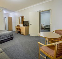 Golden Guitar Motor Inn - Accommodation Asia