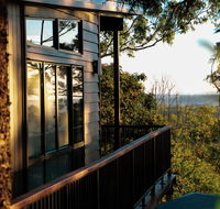 Rainforest Gardens - Luxury Hillside Chalets with Views to Bay  Islands - Accommodation Asia
