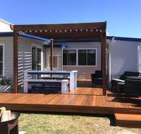 Shellharbour Beach Cottage - walk onto Patrolled beach with flags in summer - Accommodation Asia
