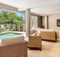 The Stanwell Beach Glass House - beach  pool - Accommodation Guide