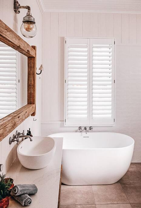 BAY PROPERTIES . Beach House Yamba - Accommodation Guide 2