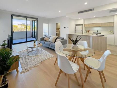Modern 2BR Suite With Balcony & Parking Near Airport - Accommodation Guide 0