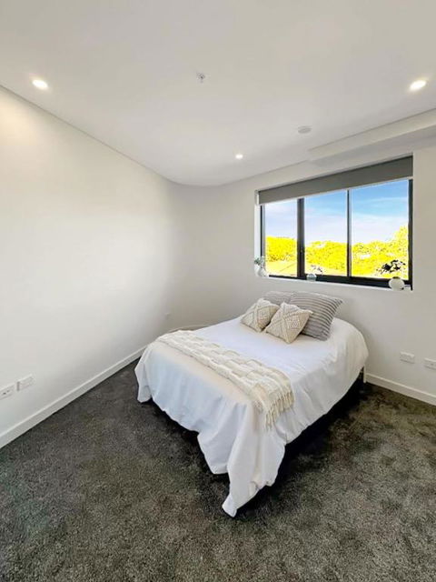 Modern 2BR Suite With Balcony & Parking Near Airport - Accommodation Guide 2