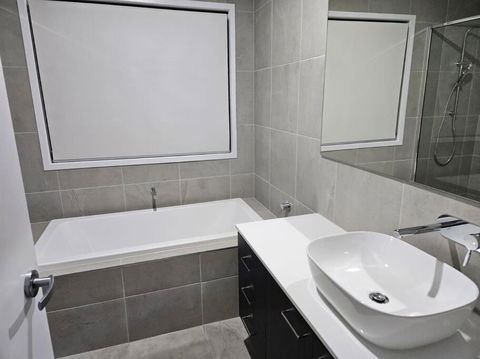 O Stylish 4 Room Oasis With 65 TV - Accommodation Guide 1