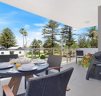Bathers at the Beach - across from Surf Beach - Accommodation Asia