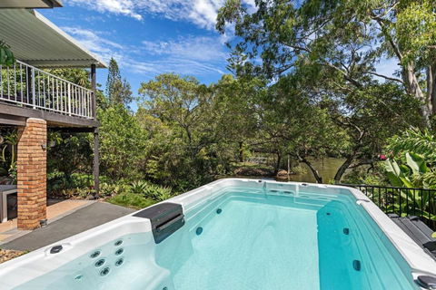 Riverfront Oasis In Elanora - Accommodation Guide 0